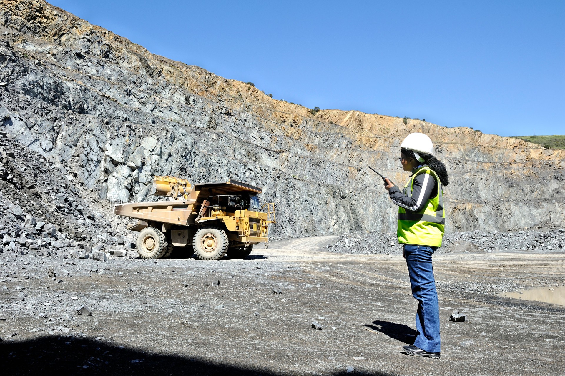 Female mine official supervising